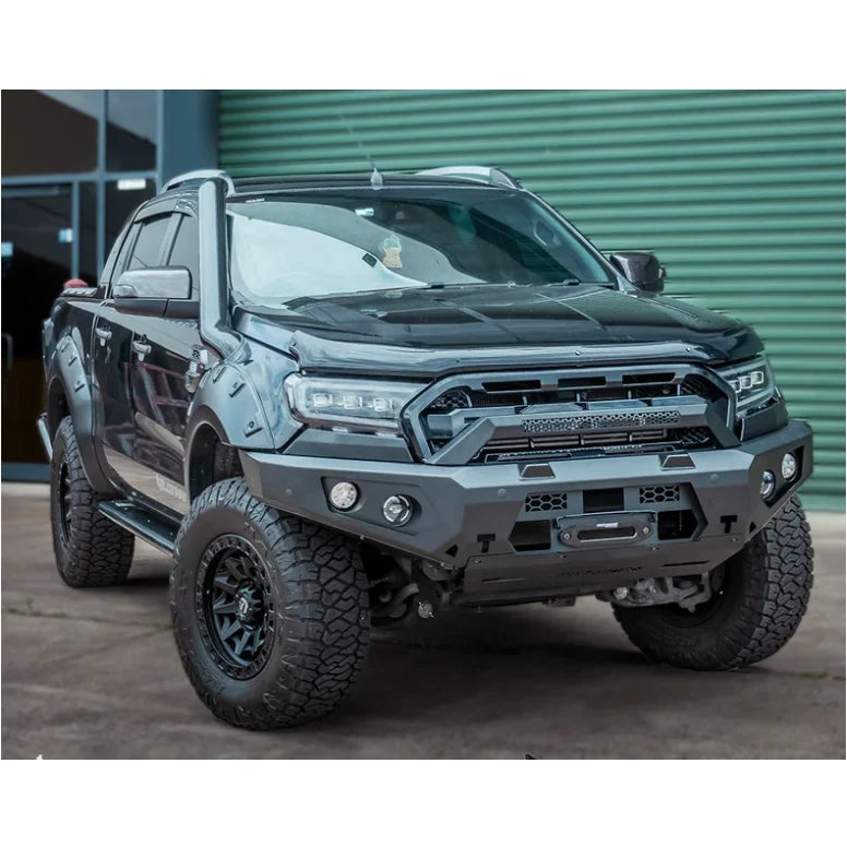 Black pickup truck with aftermarket modifications featuring Rockarmor GT Steel Hoopless Bullbar for Ford Ranger PX2 & 3, enhancing rated recovery points and approach angles