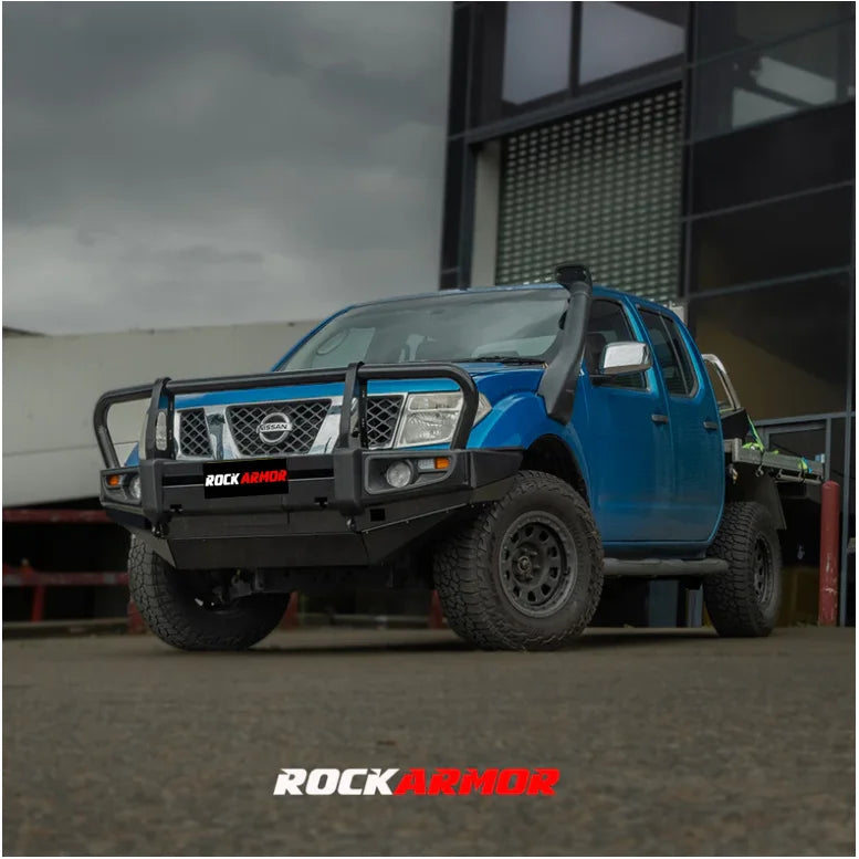 Blue Nissan pickup truck with black steel bullbar from Rockarmor Premium Steel collection