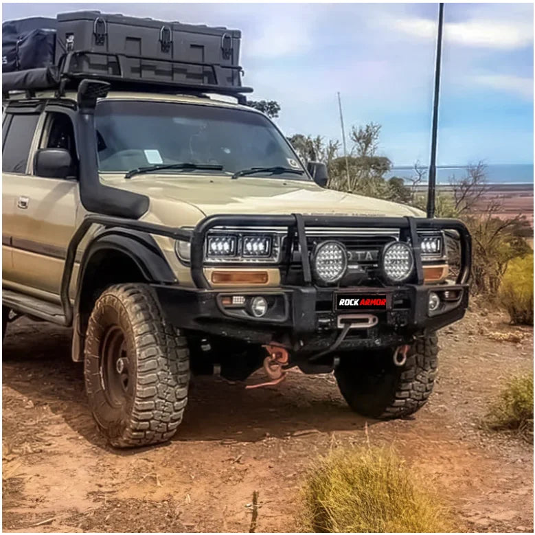 Off-road Toyota Land Cruiser with Rockarmr steel bullbar and fog lights installed