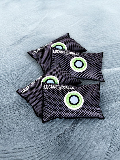 4 reusable anti condensation bags sitting in a tent 