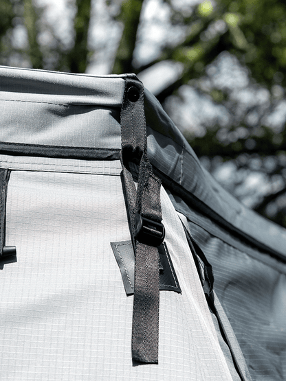 Close up view of the Lucas Creek  180 Fantail free standing awning with the outer wall kit installed - highlighting the straps that mean this won’t blow off in heavy winds!