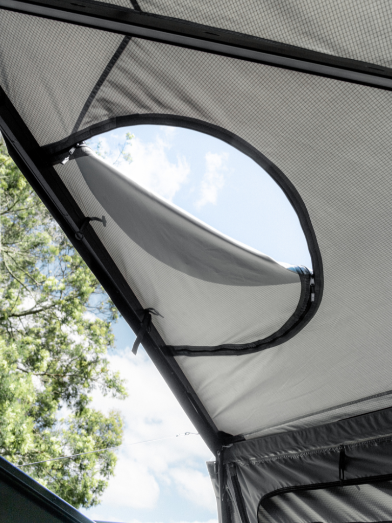 Lucas Creek 270 Fantail awning showing the Roof hatch option open - for climbing into your end opening hard shell tent via the ladder from under the awning 