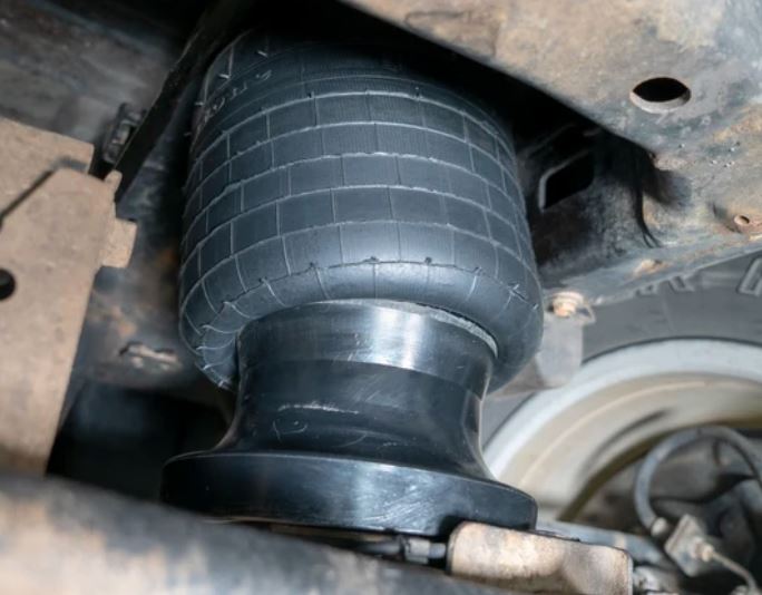 VEHICLE SPECIFIC AIR BAG HELPER KITS.