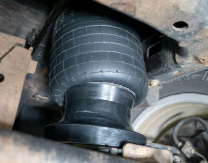 VEHICLE SPECIFIC AIR BAG HELPER KITS.